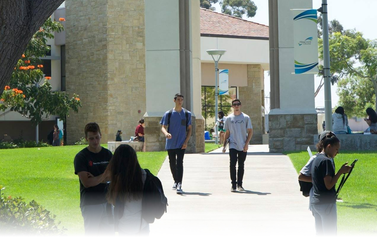students walking on sidewalk
