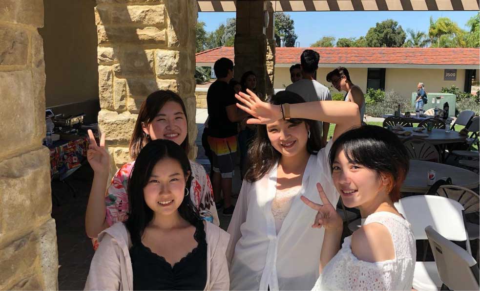 young women pose for selfie