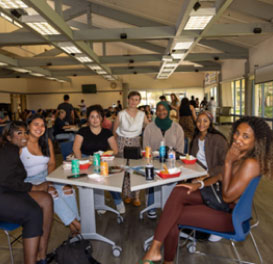 students eating at event
