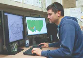 man working on computer
